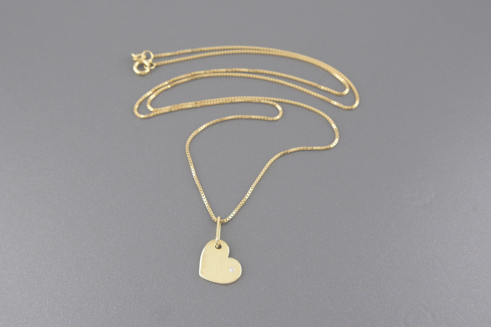 Colar Coração em Ouro Amarelo 18k com Brilhante de Aprox. 1pt