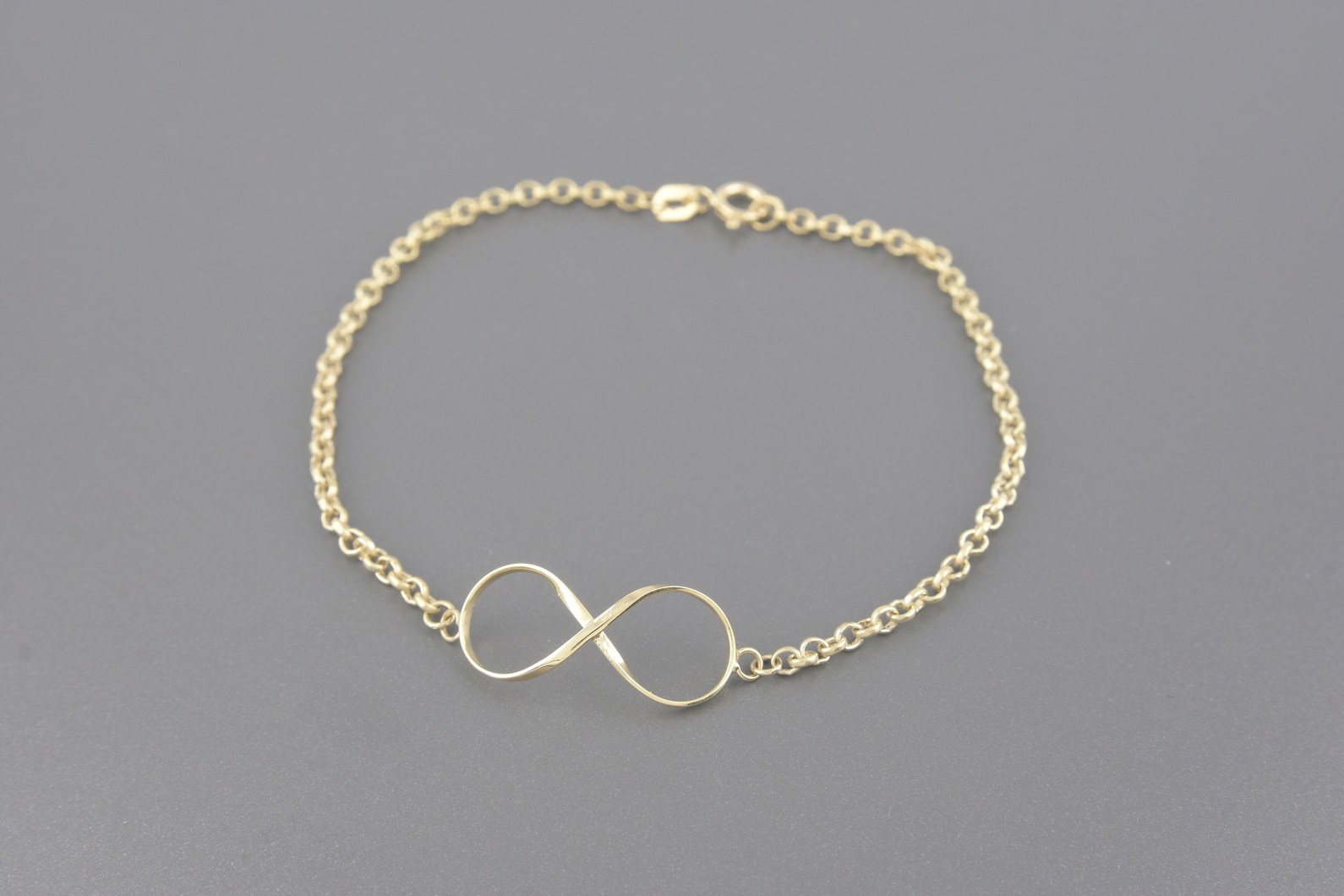Pulseira Infinito em Ouro Amarelo 18k
