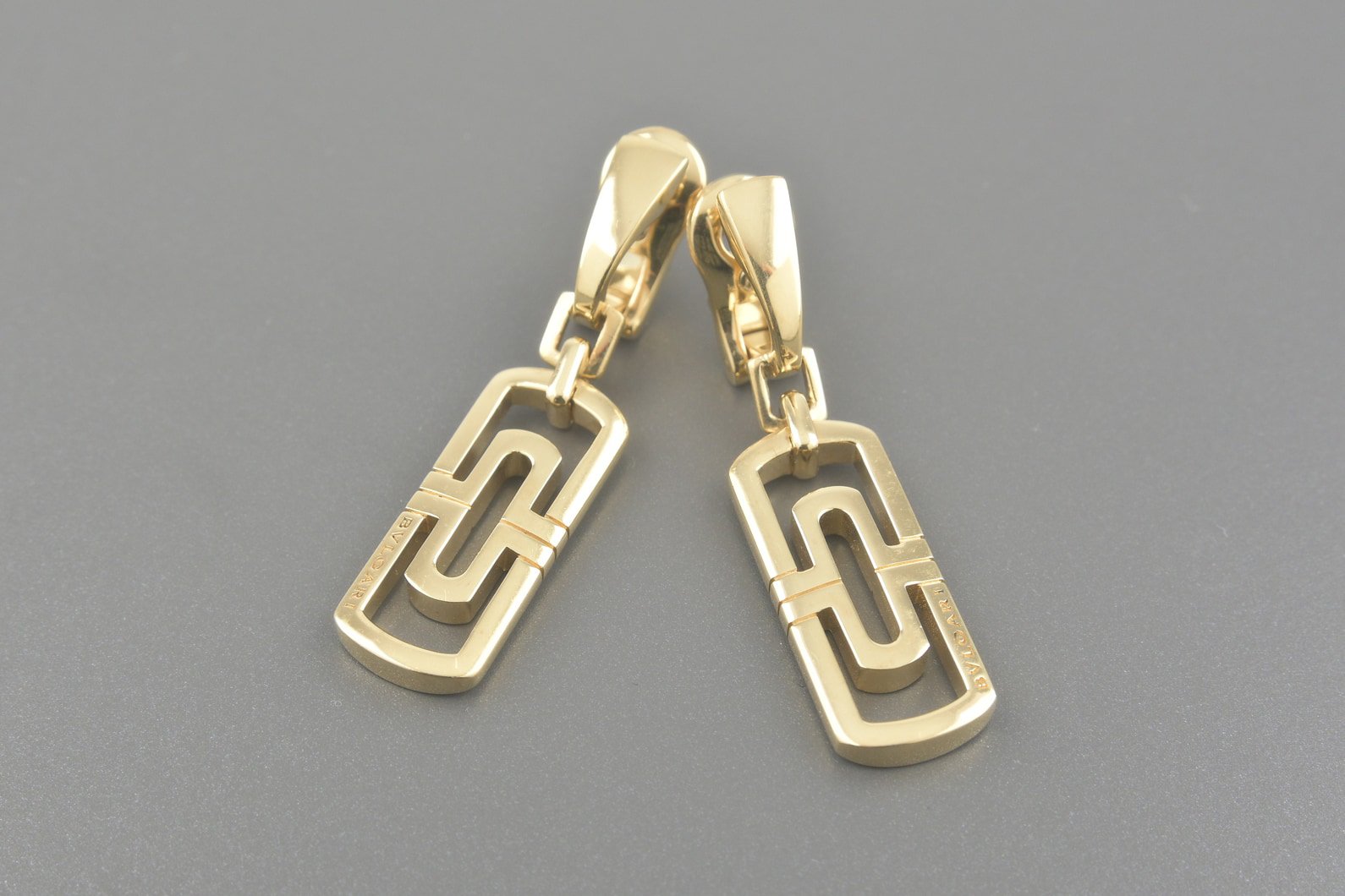 Brincos Parentesi em Ouro Amarelo 18k