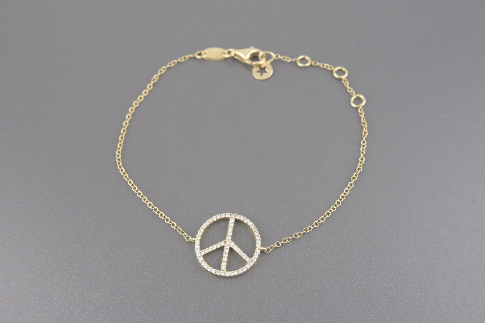 Pulseira Peace em Ouro Amarelo 18k com Aprox. 33pts de Brilhantes