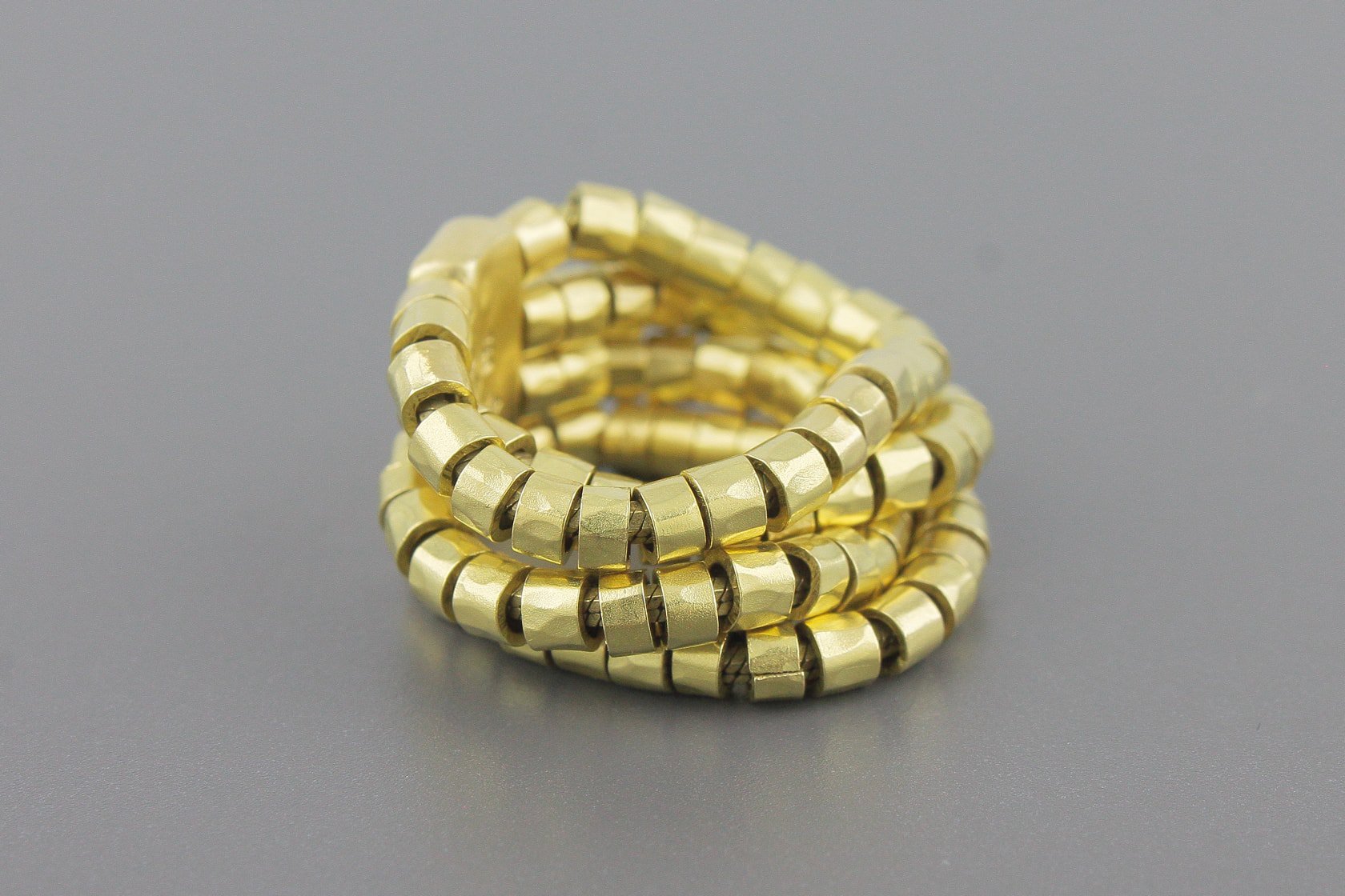 Anel Maleável em Ouro Amarelo 18k com Diamante Princess de Aprox. 1.5pts