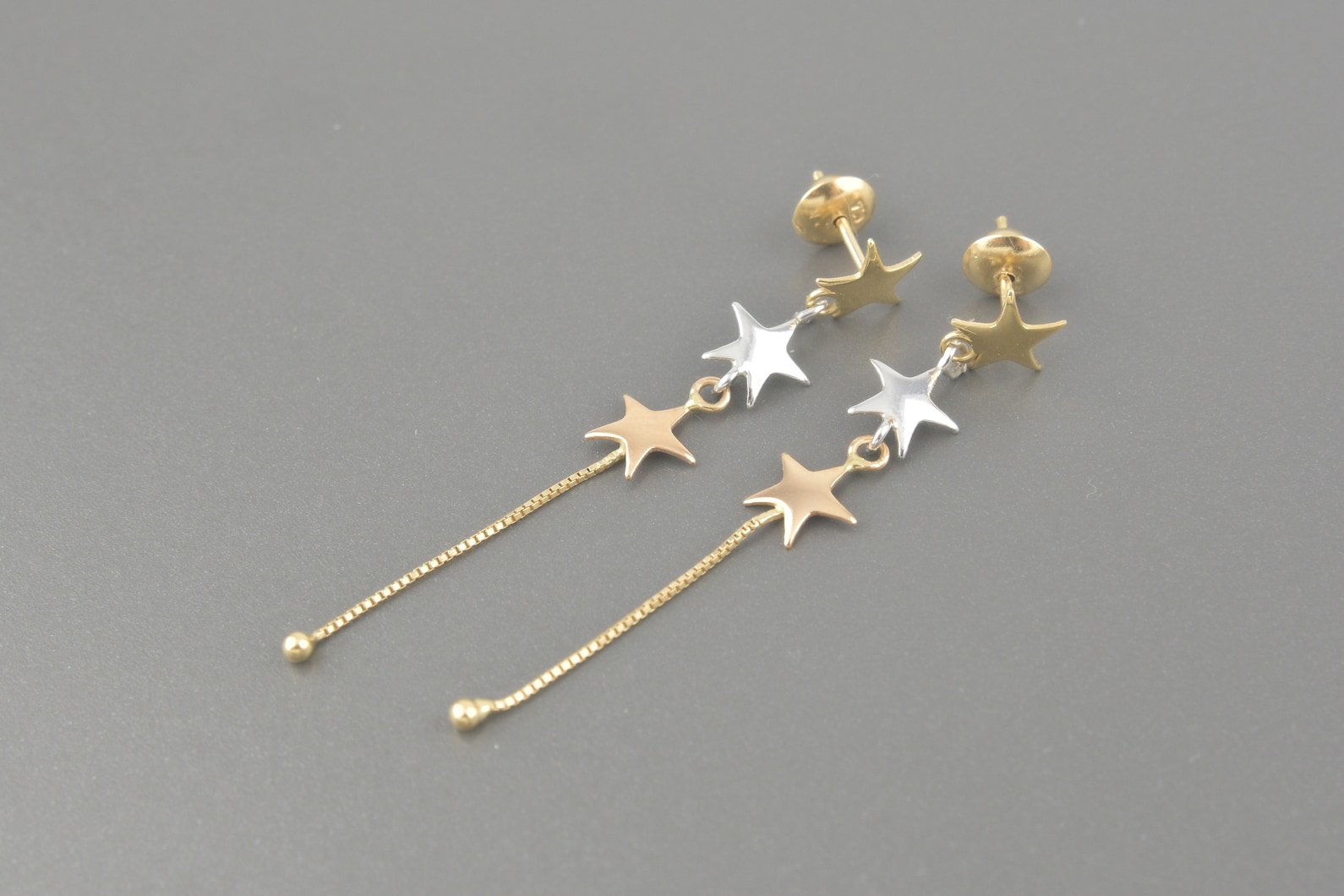 Brincos Estrelas em Ouro Amarelo, Branco e Rose 18k