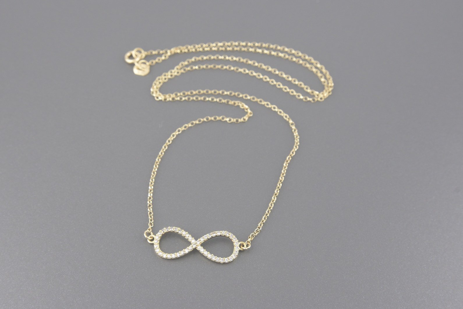 Colar Infinito em Ouro Amarelo 18k com Zirconias