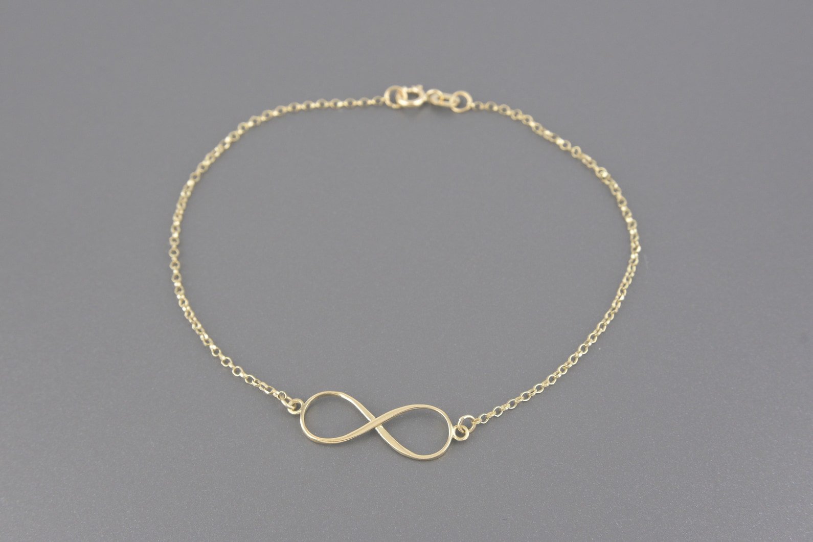 Pulseira Infinito em Ouro Amarelo 18k