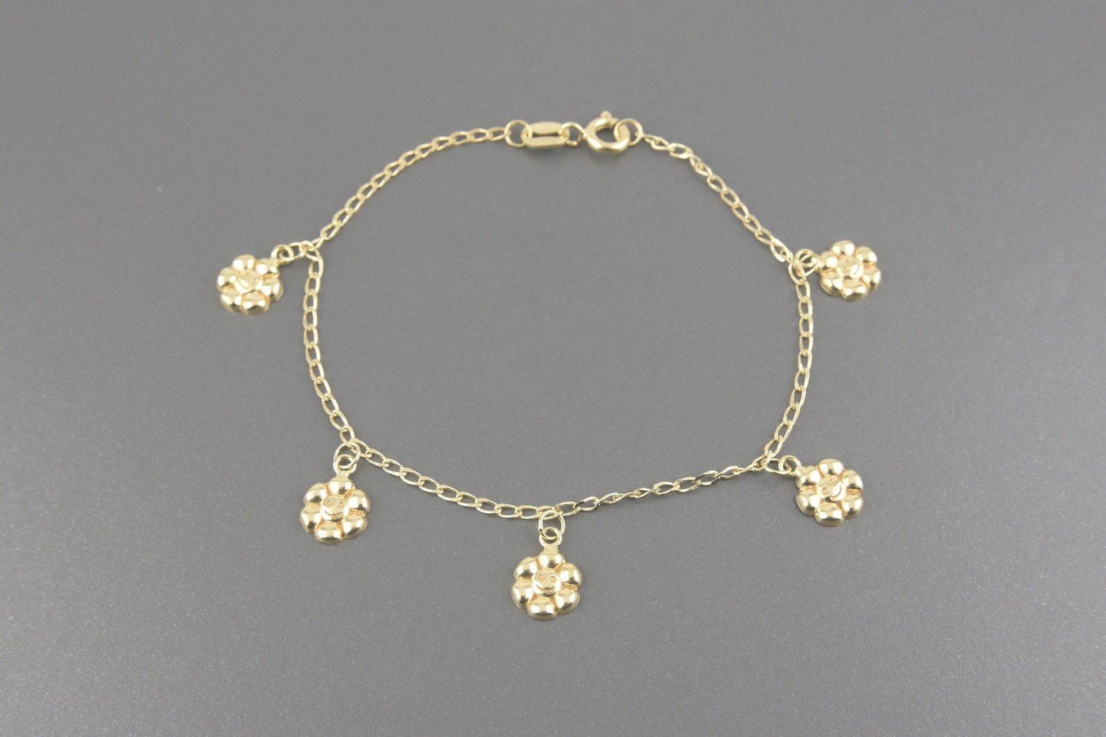 Pulseira Florzinhas em Ouro Amarelo 18k