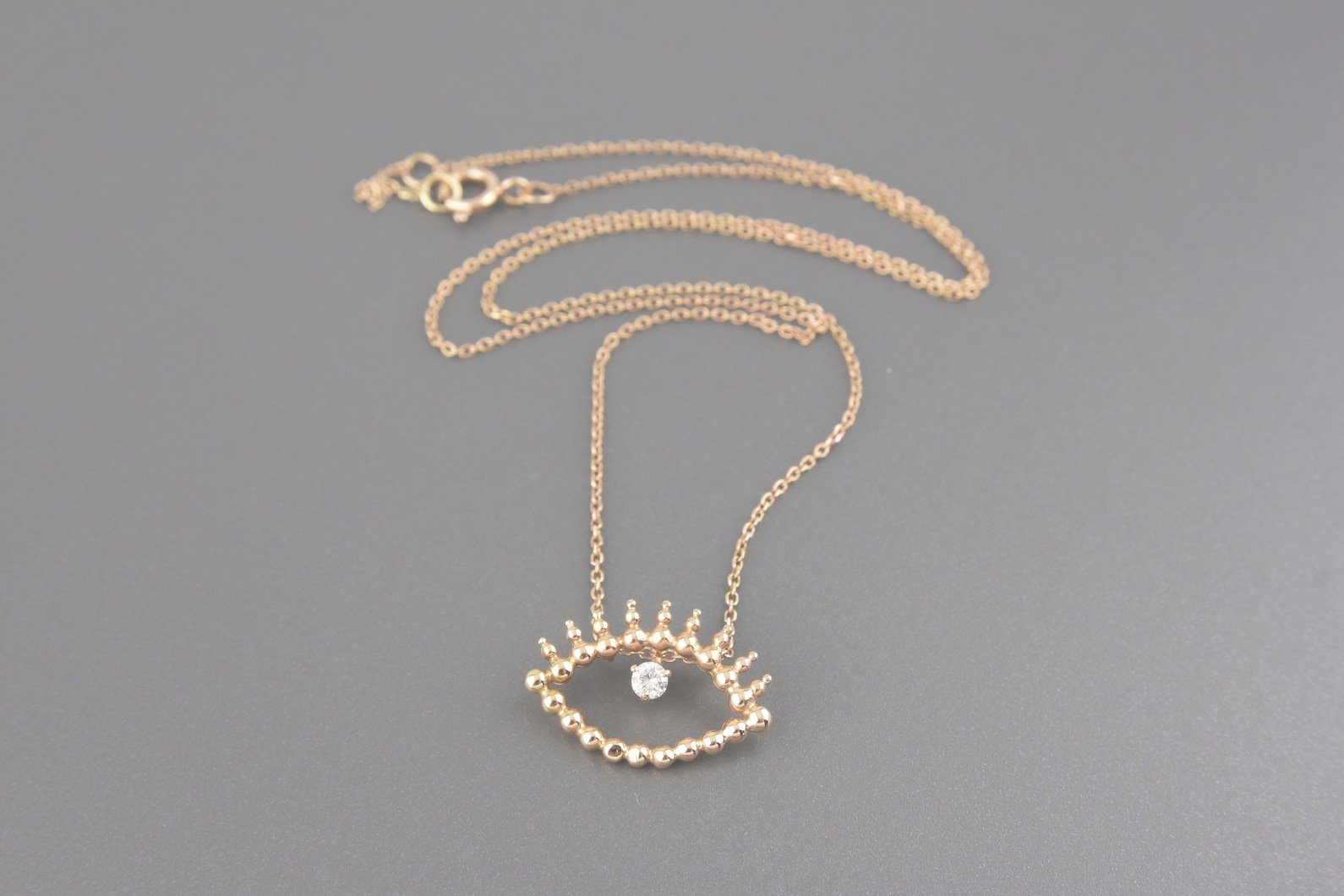 Colar Olho em Ouro Rose 18k com Brilhante de Aprox. 0.08ct